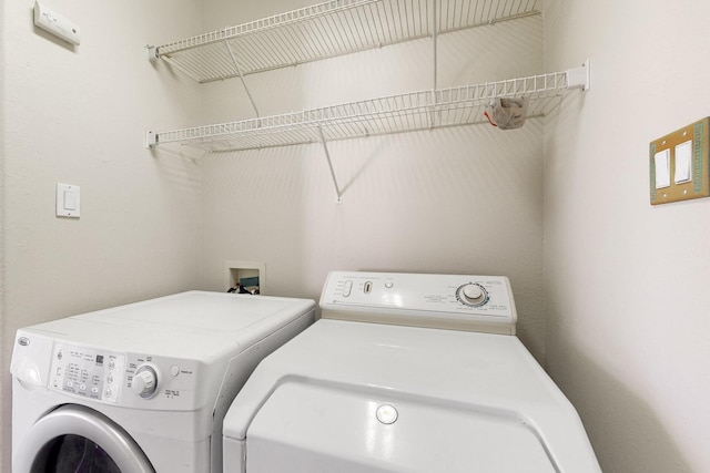 laundry room with washer and dryer