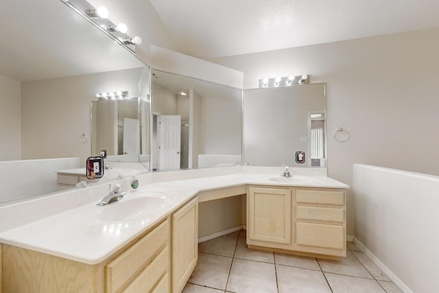 bathroom featuring tile patterned floors and vanity