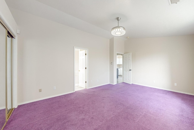 unfurnished bedroom with a closet and carpet