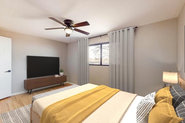 bedroom featuring ceiling fan and wood-type flooring