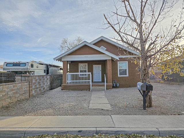 bungalow featuring covered porch