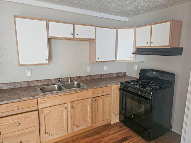 kitchen featuring white cabinetry, sink, dark wood-type flooring, black range with gas cooktop, and a textured ceiling