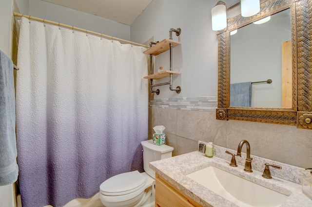 bathroom featuring vanity, toilet, tile walls, and curtained shower