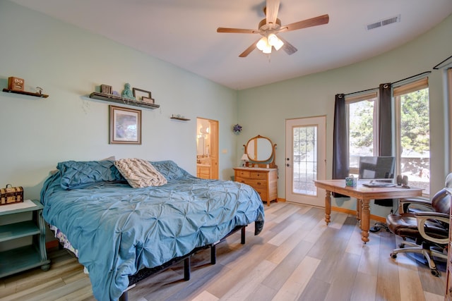 bedroom featuring access to outside, ceiling fan, and light wood-type flooring