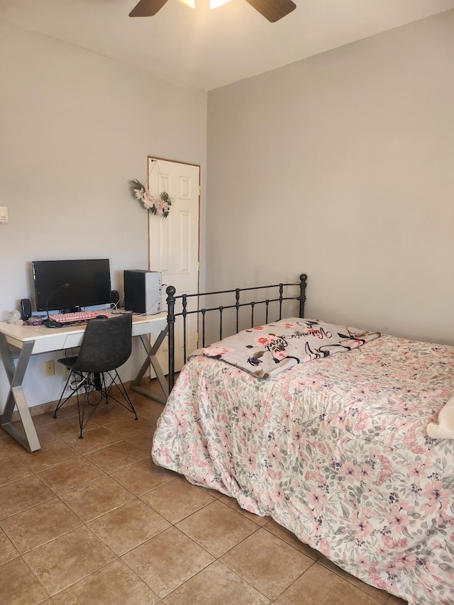 bedroom with tile patterned flooring and ceiling fan