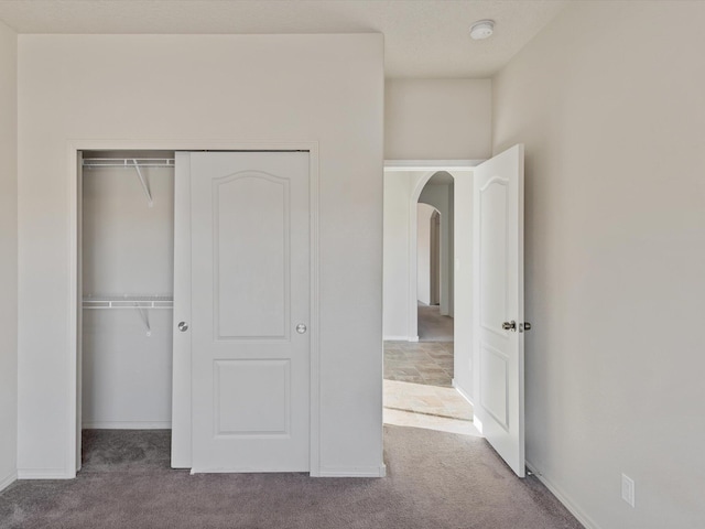 6409 Osprey Dr NE, Rio Rancho, NM 87144 - unfurnished bedroom with a closet and carpet floors