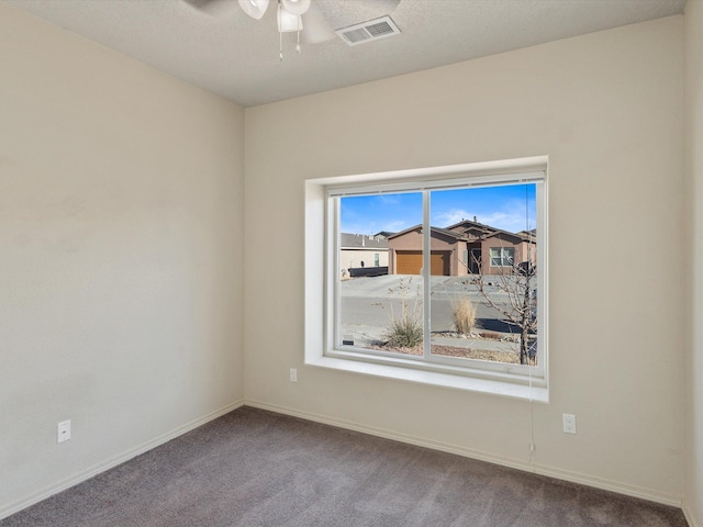 6409 Osprey Dr NE, Rio Rancho, NM 87144 - empty room featuring carpet and ceiling fan