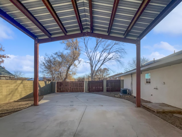 437 El Llano Ln NW, Los Ranchos, NM 87107 - fenced backyard featuring a patio area