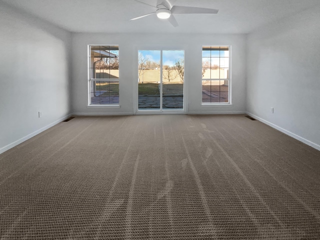 437 El Llano Ln NW, Los Ranchos, NM 87107 - spare room with a ceiling fan, plenty of natural light, and carpet floors