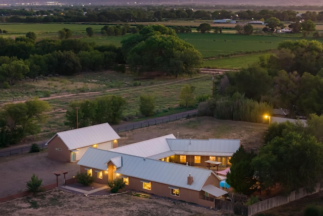 birds eye view of property featuring a rural view