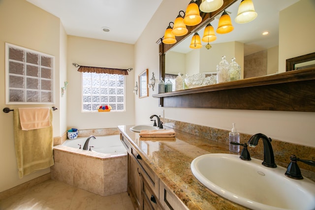 bathroom with vanity, tiled bath, and tile patterned floors