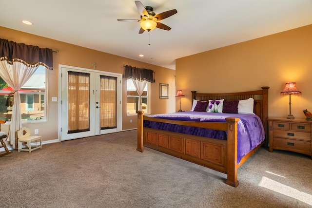 carpeted bedroom with access to exterior, french doors, and ceiling fan