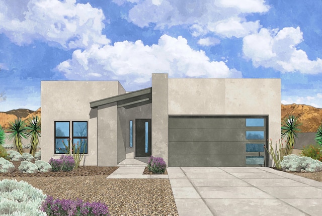 1017 Aleen Rd SE, Rio Rancho, NM 87124 - view of front facade featuring driveway, stucco siding, and a garage