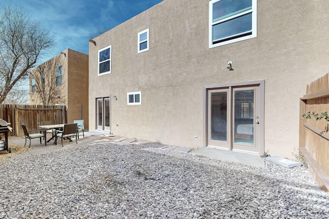 back of house featuring a patio