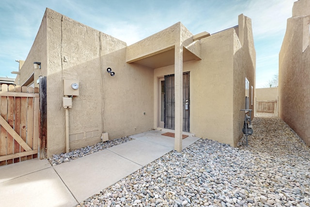 rear view of house featuring a patio