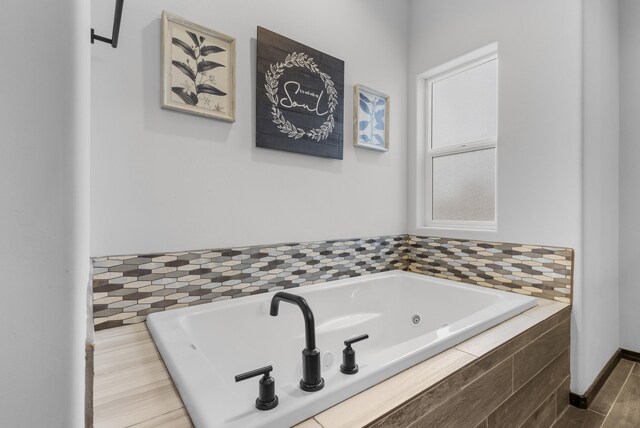 bathroom featuring a whirlpool tub