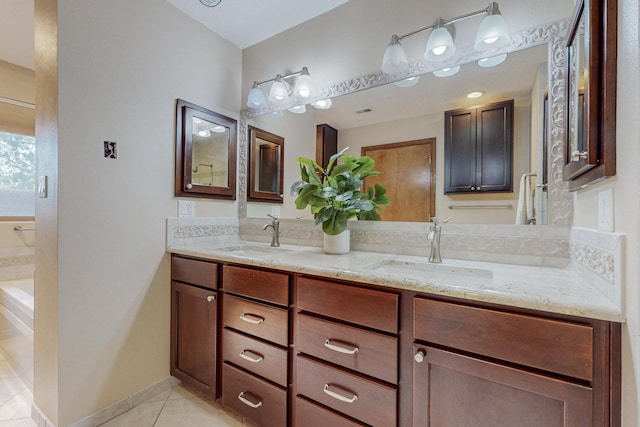 bathroom with vanity and tile patterned floors