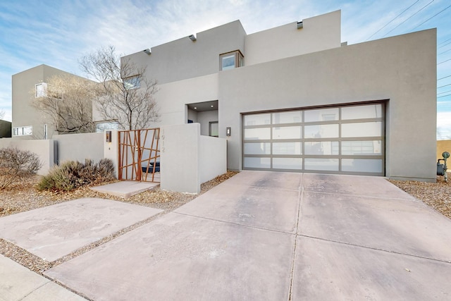 adobe home featuring a garage