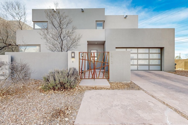 adobe home featuring a garage