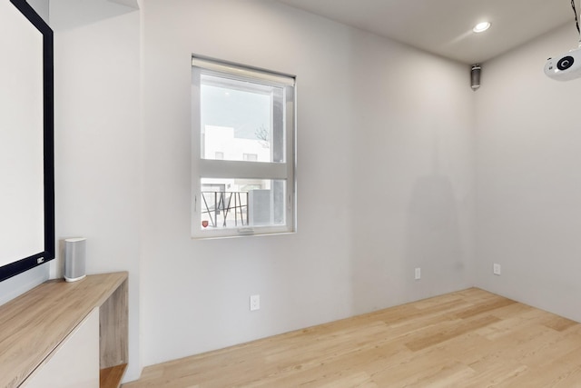 spare room with light wood-type flooring