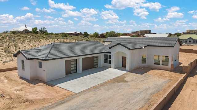 view of front of property with a garage