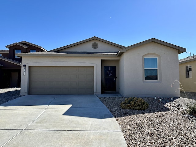 ranch-style home with a garage