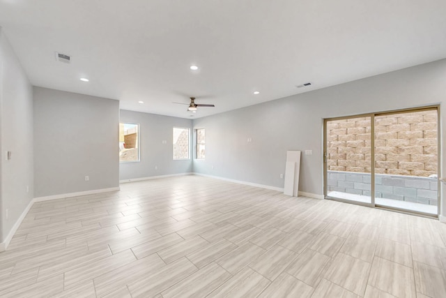 spare room featuring ceiling fan