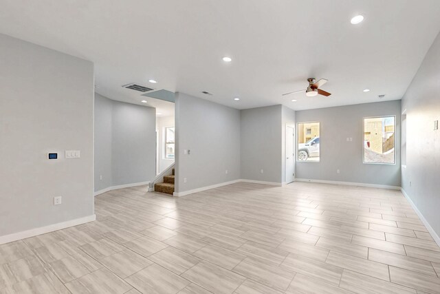 13601 Covered Wagon Ave SE, Albuquerque, NM 87123 - empty room with recessed lighting, visible vents, stairs, and ceiling fan