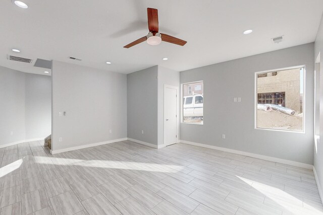 13601 Covered Wagon Ave SE, Albuquerque, NM 87123 - spare room featuring recessed lighting, visible vents, baseboards, and ceiling fan