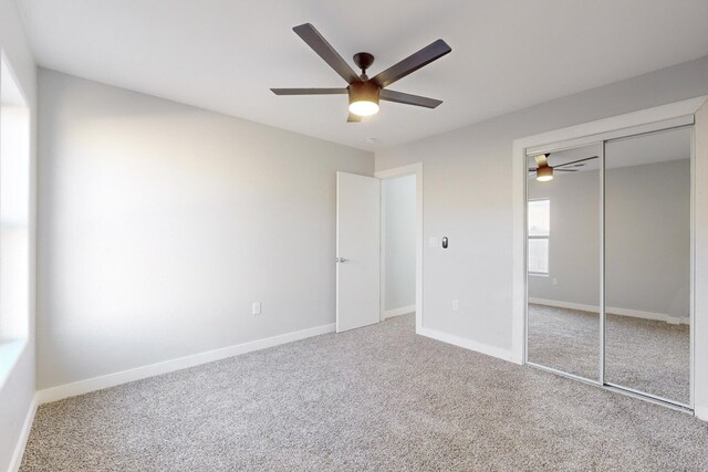 13601 Covered Wagon Ave SE, Albuquerque, NM 87123 - unfurnished room featuring ceiling fan, light carpet, visible vents, and baseboards