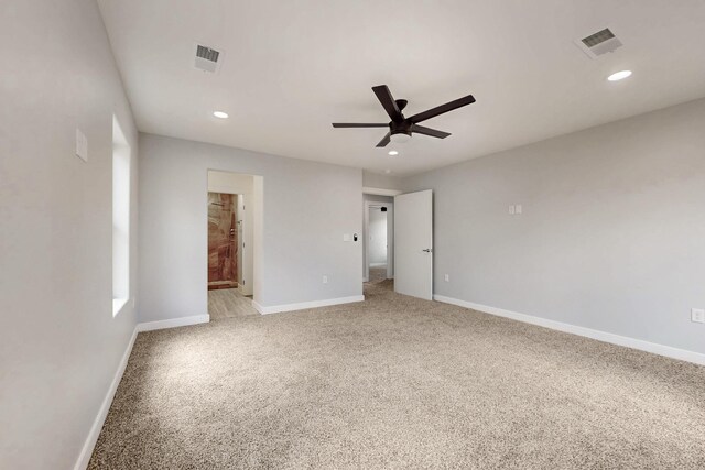 13601 Covered Wagon Ave SE, Albuquerque, NM 87123 - empty room featuring plenty of natural light, carpet flooring, a ceiling fan, and baseboards