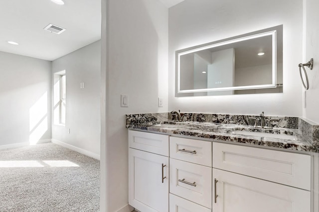 bathroom featuring vanity