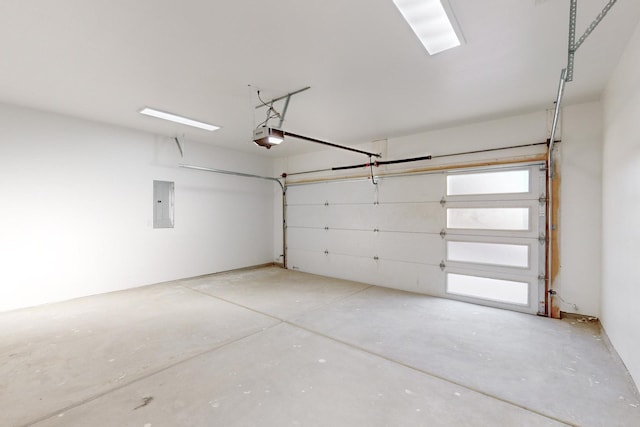 garage featuring a garage door opener and electric panel