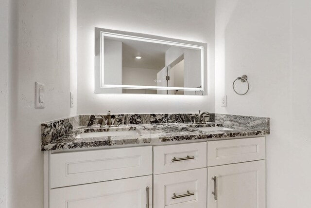13601 Covered Wagon Ave SE, Albuquerque, NM 87123 - bathroom featuring baseboards, toilet, and vanity