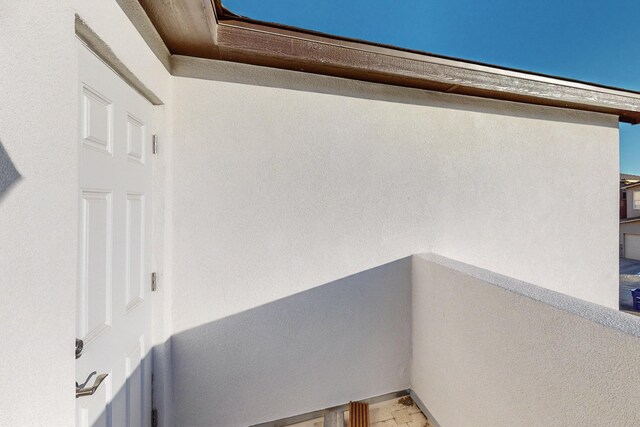 13601 Covered Wagon Ave SE, Albuquerque, NM 87123 - view of side of property featuring stucco siding