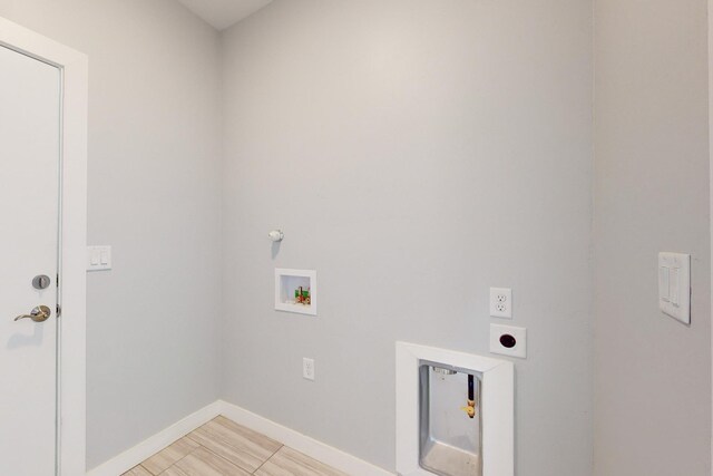13601 Covered Wagon Ave SE, Albuquerque, NM 87123 - clothes washing area featuring baseboards, washer hookup, laundry area, and hookup for an electric dryer