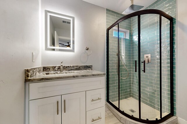 13601 Covered Wagon Ave SE, Albuquerque, NM 87123 - full bathroom with visible vents, vanity, and a stall shower