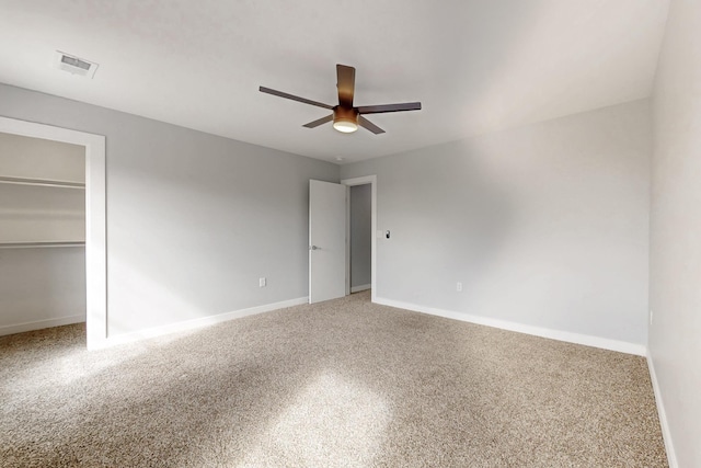 unfurnished bedroom featuring ceiling fan and carpet flooring