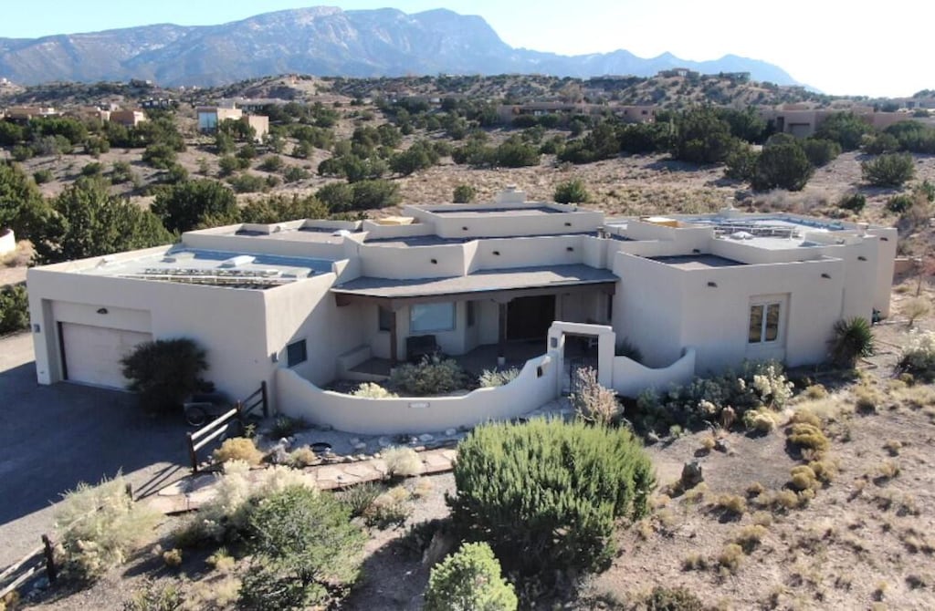 bird's eye view with a mountain view