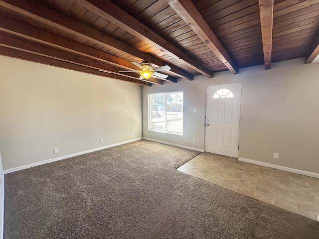 carpeted foyer featuring beam ceiling, ceiling fan, and wooden ceiling