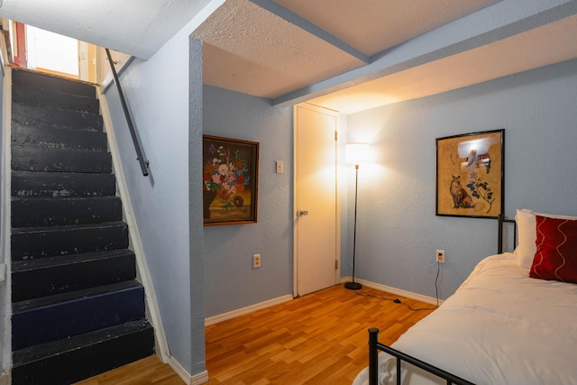 bedroom with light hardwood / wood-style flooring