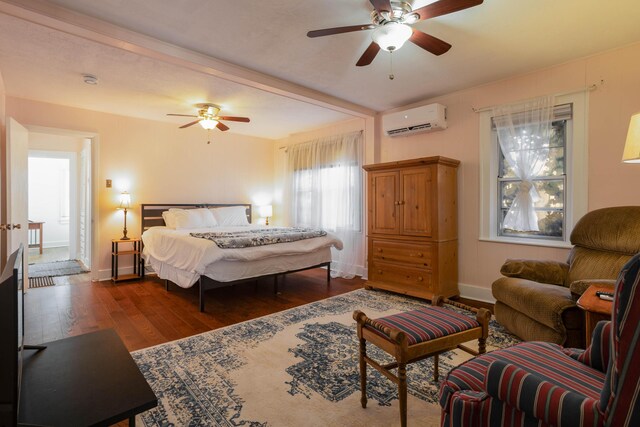 bedroom featuring an AC wall unit, dark hardwood / wood-style floors, and ceiling fan