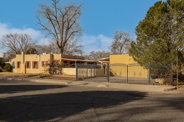 exterior space with a carport