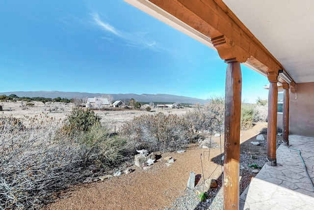 exterior space featuring a mountain view