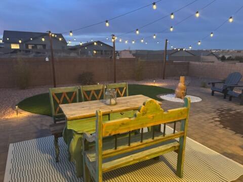 view of patio terrace at dusk