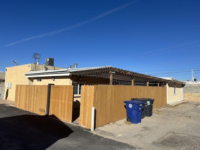 view of home's exterior featuring central AC