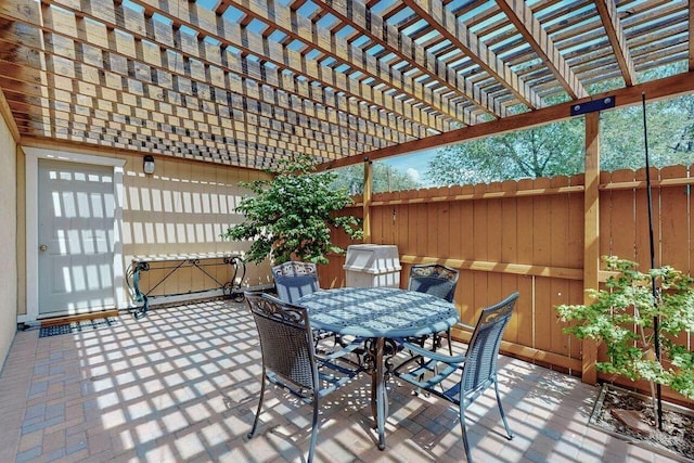 view of patio featuring a pergola