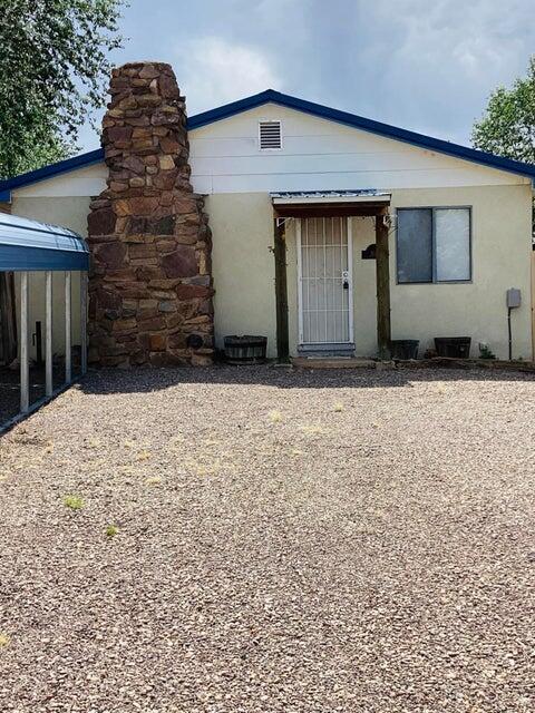 view of front of house featuring stucco siding