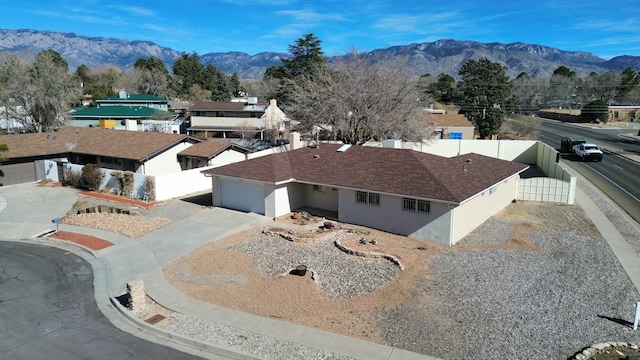 birds eye view of property featuring a mountain view