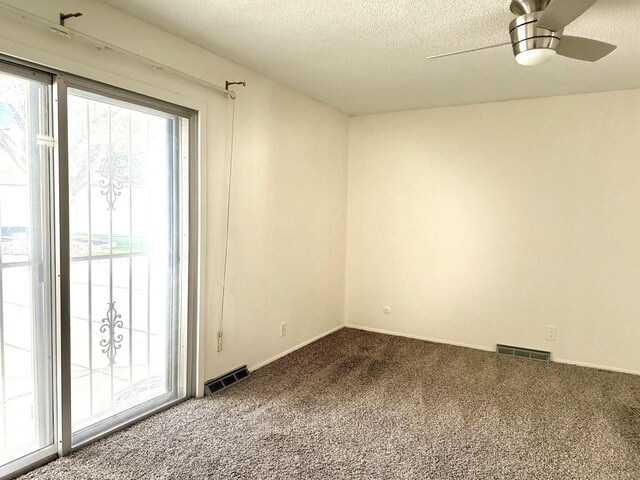 hallway featuring a textured ceiling